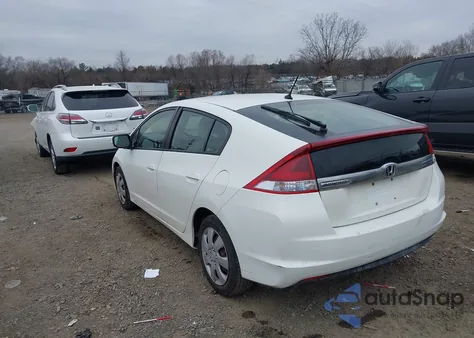 2012 Honda Insight z USA, uszkodzony, nr VIN JHMZE2H3XCS000193